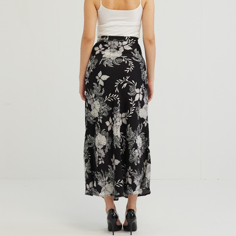 CULTIVATION [RAYA 2023] Floral Printed Long Bias Skirt (Black) | Isetan KL Online Store